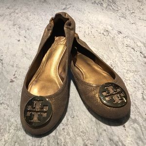 Tory Burch Reva size 7M; brushed/distressed gold